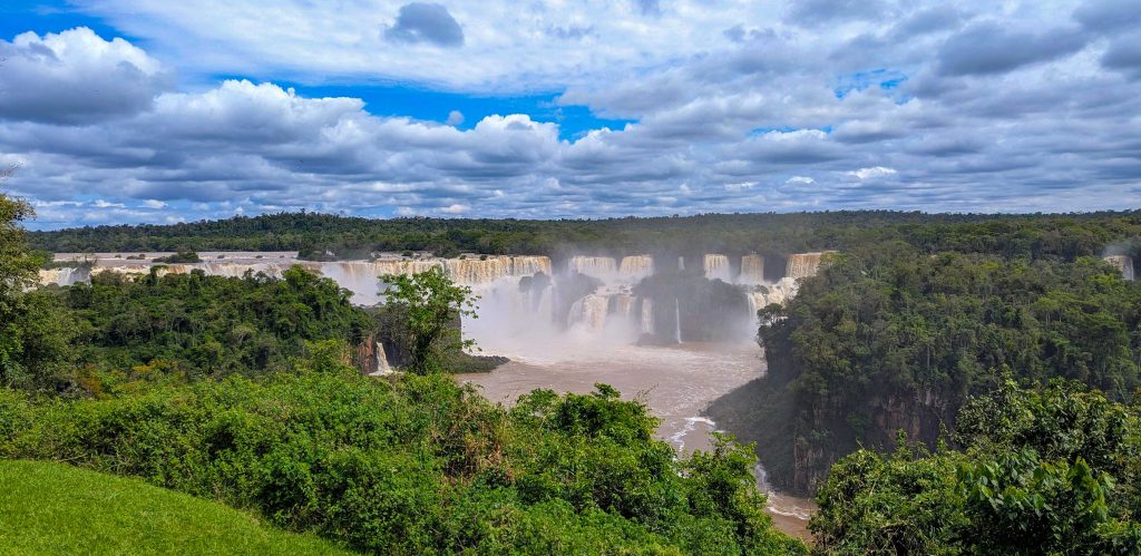 Torrents of river water cascading over basalt rock tiers in the Brazilian sector of Iguazu Falls