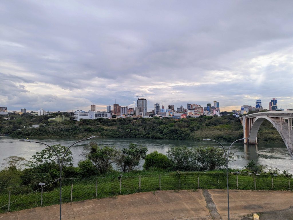 Concrete arch of the Friendship Bridge spanning the Parana River toward Ciudad del Este