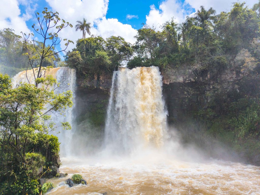 Elevated metal catwalk spanning the upper river torrents above the drops in Argentine Iguazu