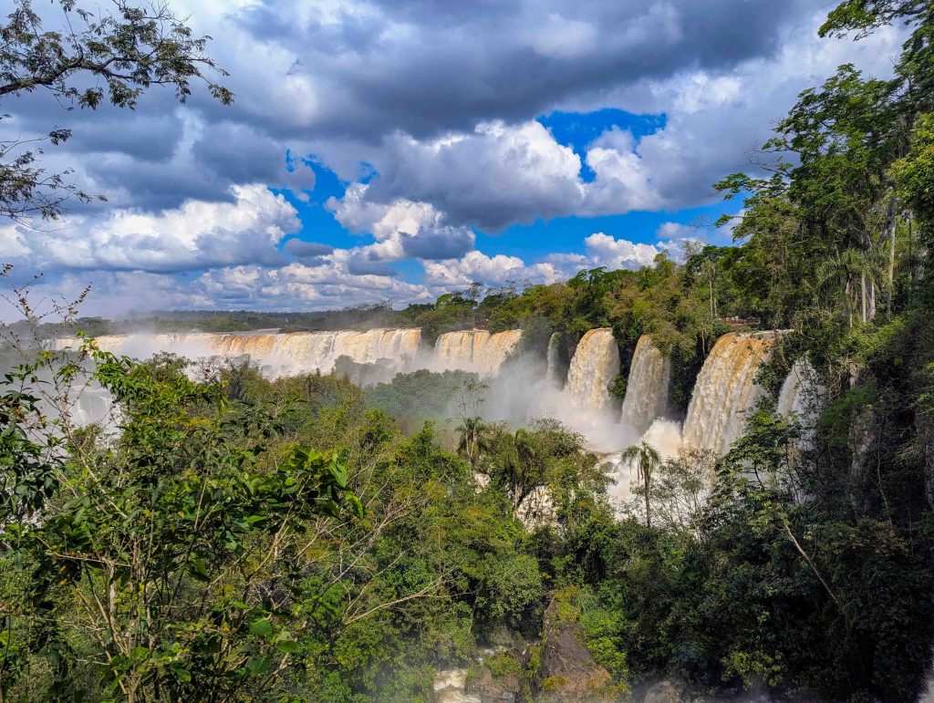 View from the upper catwalk circuit looking across multiple cascading tiers in Argentine Iguazu