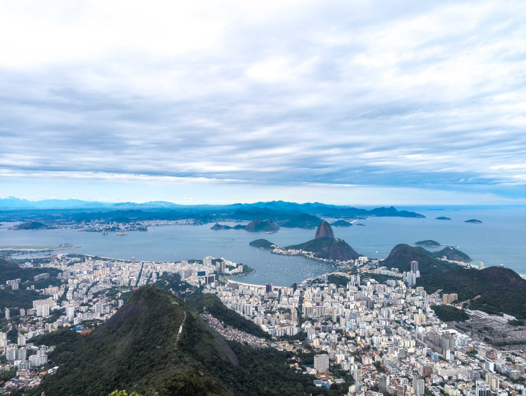 Panoramic view from Mount Corcovado overlooking Botafogo Bay and Sugarloaf Mountain in Rio de Janeiro